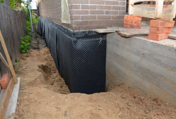 Happy homeowners after waterproofing job in New Brunswick